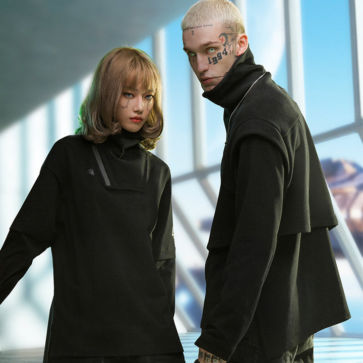 Two individuals in black, high-collared outfits stand indoors with a modern, geometric window structure in the background. One person has blonde hair, while the other showcases tattoos on their face and neck. Their attire reflects contemporary youth fashion trends, blending style and comfort seamlessly with the Punk Fake Two-piece Plush And Thick High Neck Loose Top from Maramalive™.