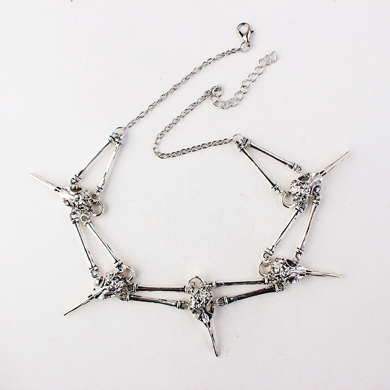 A woman is wearing a Maramalive™ Gothic bird skull necklace.