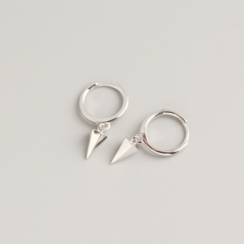 A pair of Geometric Punk Ear Buckle Earrings in gold, silver and black by Maramalive™.