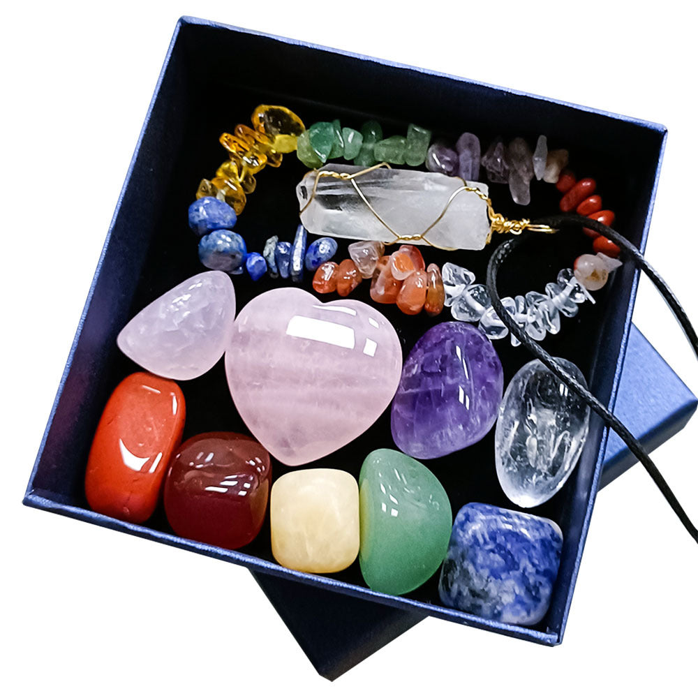 A box containing a variety of Maramalive™ Chakra Combination Love Pillar stones and crystals.