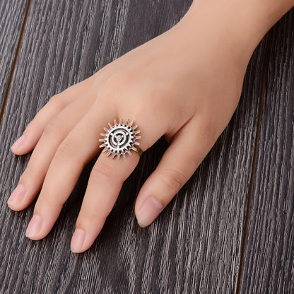 A woman's hand with a Retro Steampunk 3 Ring Gear Ring Jewelry by Maramalive™ on it.