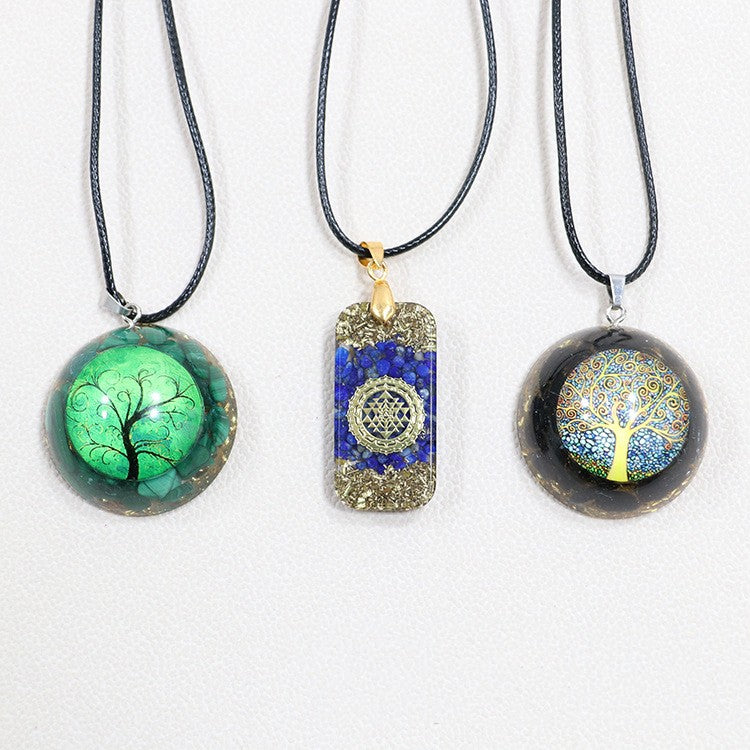 Three Natural Crystal Gravel Personalized Pendants for Men and Women from Maramalive™, with different designs on them.