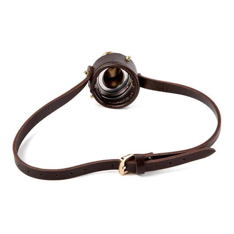 A Maramalive™ brown leather headband with a brass ring on it.