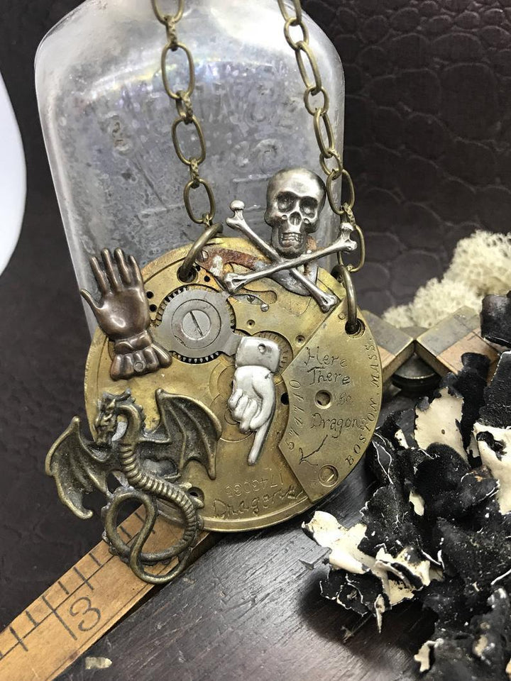 A Maramalive™ Skull Magic Sword Dragon Pendant Vintage Mechanical Necklace.