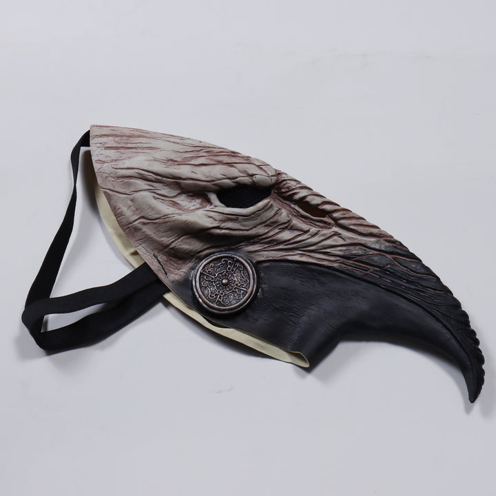 A man in a Maramalive™ Halloween Plague Doctor Mask Steampunk Beak Black Death Virus Cosplay Latex Headgear Mask holding a gun.