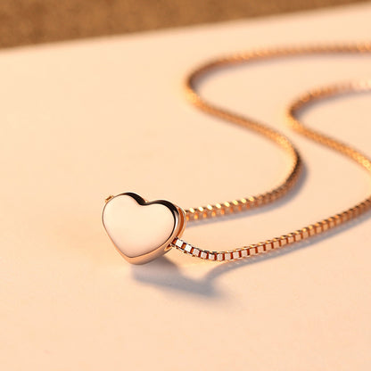 A small Minimalist Necklace from Maramalive™ on top of a table.