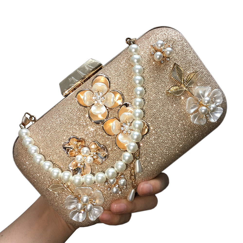 Diamond-studded pearl petal chain tassel dinner bag