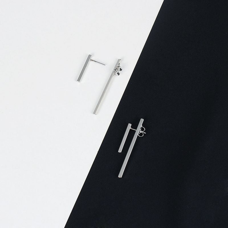 A pair of Minimalism Gold Silver Punk Simple Bar Earrings For Women Geometry Ear Earrings Fine Jewelry by Maramalive™ on a black and white background.