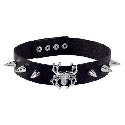 A woman wearing a Gothic Rivet Necklace with skulls and spikes by Maramalive™.