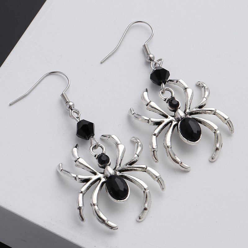 A pair of Alluring Arachnids: Dark Art Gothic Beautiful Style Black Spider Earrings Design Sense Punk by Maramalive™, perfect for arachnid enthusiasts.