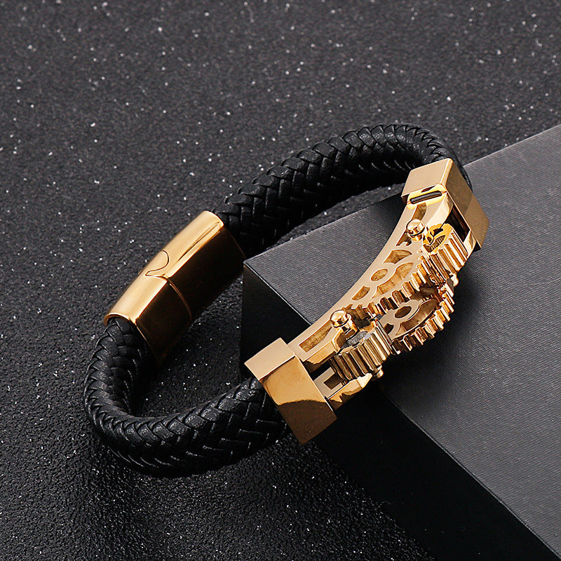 A Men's Titanium Steel Biker Bracelet Gear Braided Leather with a gold clasp by Maramalive™.