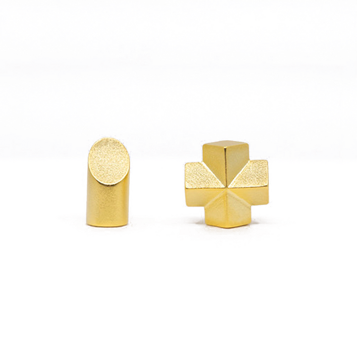 A woman's ear with a pair of Maramalive™ Geometric Earrings for Women.