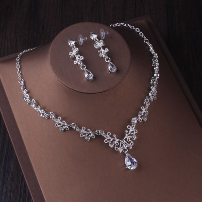 A Silver Crystal Drop Bridal Jewelry Set by Maramalive™ in a box.