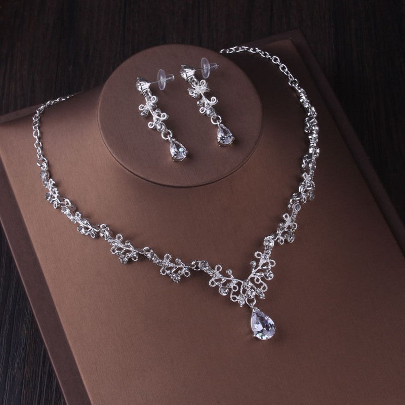 A Silver Crystal Drop Bridal Jewelry Set by Maramalive™ in a box.