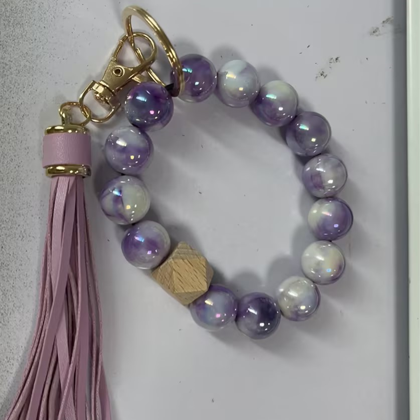 A Fashion Versatile Beaded and Tassled Jewelry Bracelet with purple beads by Maramalive™.