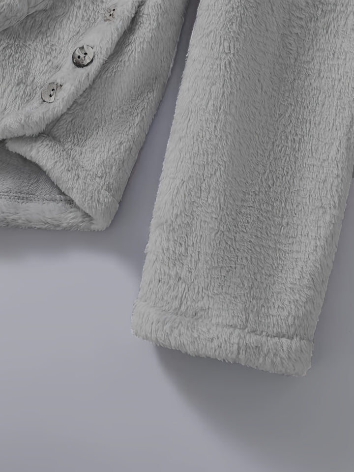 Close-up of a light gray, fluffy fabric garment with buttons, showing a portion of a sleeve and part of the body section. This cozy comfortable winter wear is perfect for chilly days. Introducing the Maramalive™ Graphic Print Fluffy Loose Cat Ears Hoodie, Casual Hooded Pocket Fashion Long Sleeve Sweatshirt for Women's Clothing.