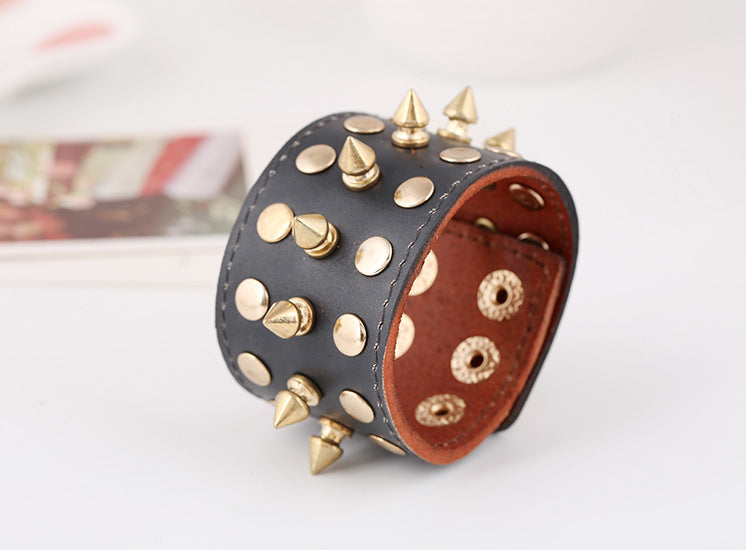 An edgy Rock punk leather bracelet with spikes, perfect for those embracing European and American fashion vibes. (Brand Name: Maramalive™)