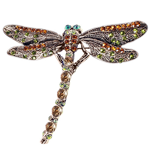 A Vintage dragonfly brooch with green rhinestone and orange stones by Maramalive™.