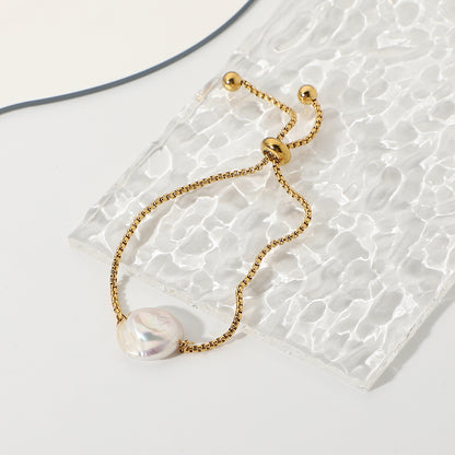 A Freshwater Baroque Pearl Waterproof Jewelry Adjustable Bracelet with a pearl on it, from Maramalive™.