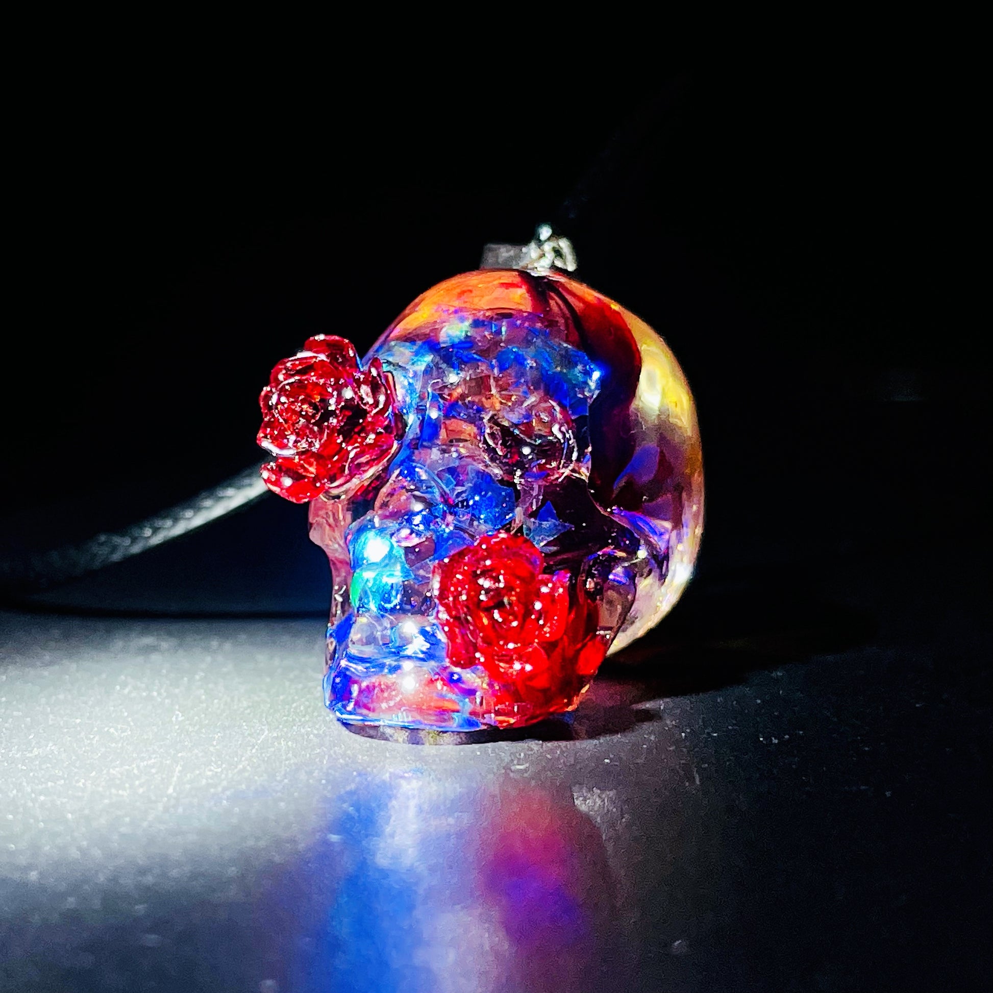 A Personality Gothic Halloween Gift Necklace Lovers with red and blue flowers on it by Maramalive™.