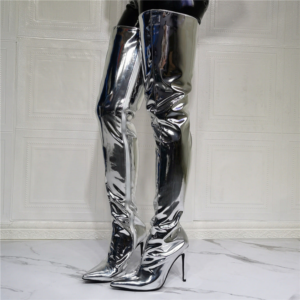 A woman donning fashionable silver Maramalive™ thigh-high boots made of artificial PU.