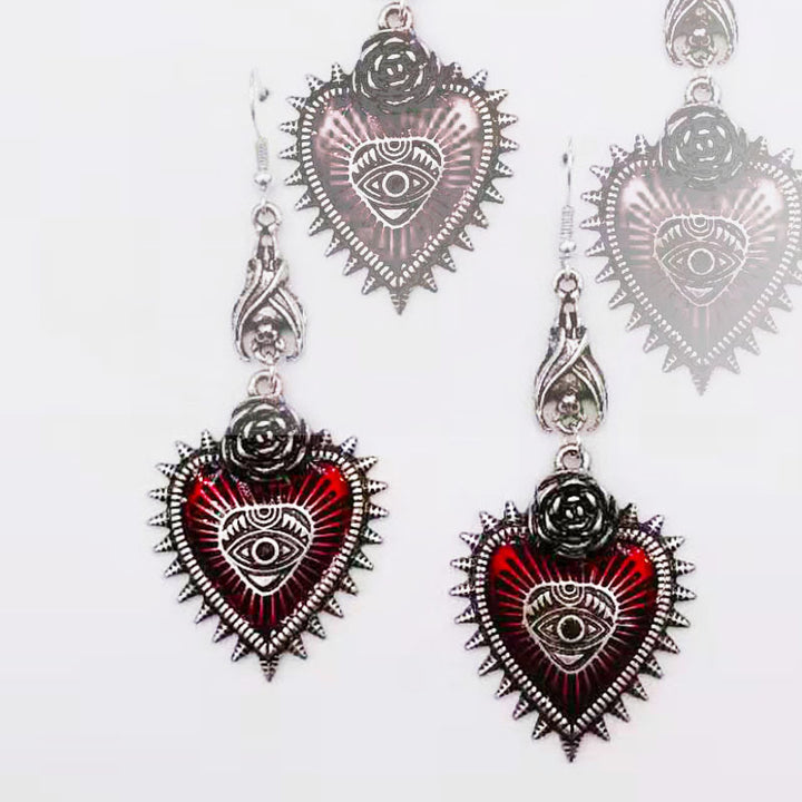 A pair of Maramalive™ Vintage Lolita Gothic Evil Eye Red Heart Earrings for Women Halloween Cosplay.