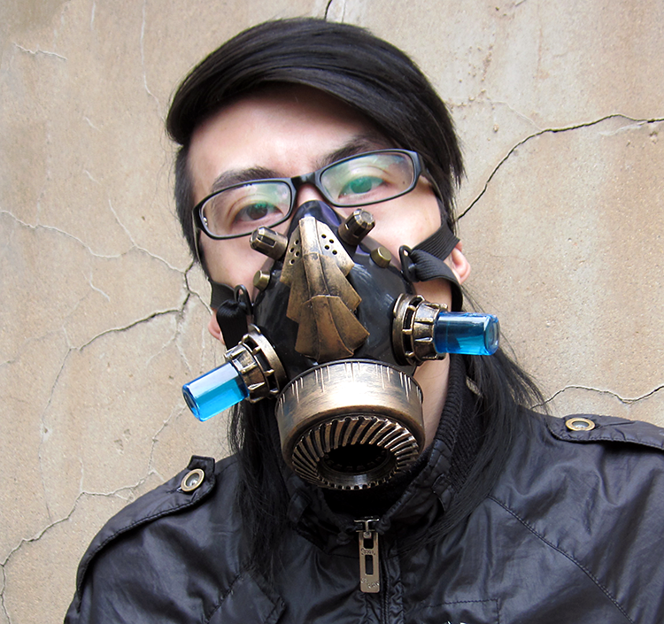 A man wearing a Steampunk Luminous Mask - Cosplay Gas Face Covering with lights by Maramalive™.