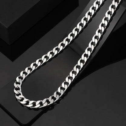 A Sterling Silver 6mm Car Flower Four-sided Chain on a black background by Maramalive™.