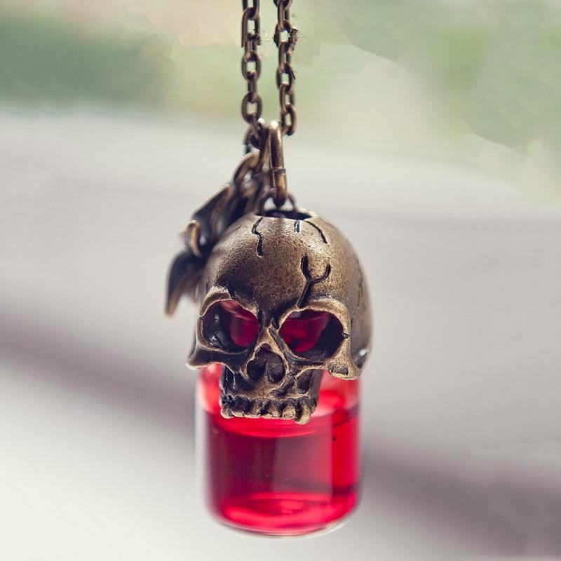 A red Skull Blood Bottle Necklace with the Maramalive™ logo, featuring a skull and spider design.