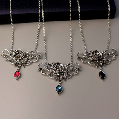 Three Flower Pendant Necklaces Halloween Black by Maramalive™ with roses on them.