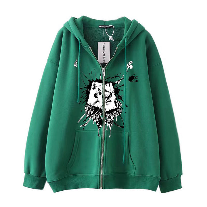 A green zip-up hoodie with a hood, drawstrings, front pockets, and a black and white abstract graphic design on the front. This urban streetwear piece also features a tag attached to the zipper. The Maramalive™ Dark Gothic Skull Sweatshirt: Unique Design for Edgy Look adds an unconventional twist to your ensemble.