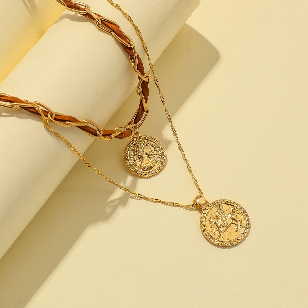 A woman wearing a Maramalive™ Chain Coin Medallion Pendant Portrait Pegasus Twin Necklace.