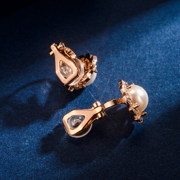 A pair of Maramalive™ Pearl Ear Clip for Women earrings in rose gold.