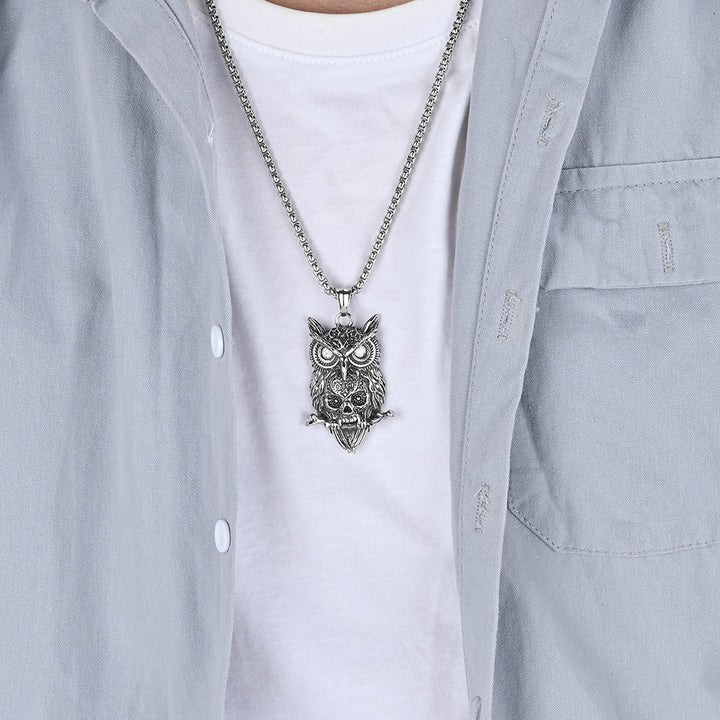 A man is wearing a Maramalive™ Captivating Statement Necklace with Edgy Style.