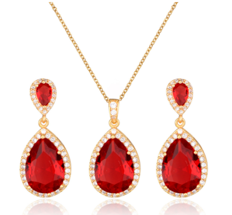 A Zircon Bridal Jewelry Set, brand Maramalive™, featuring a rose gold plated pendant and earring set with red topaz.