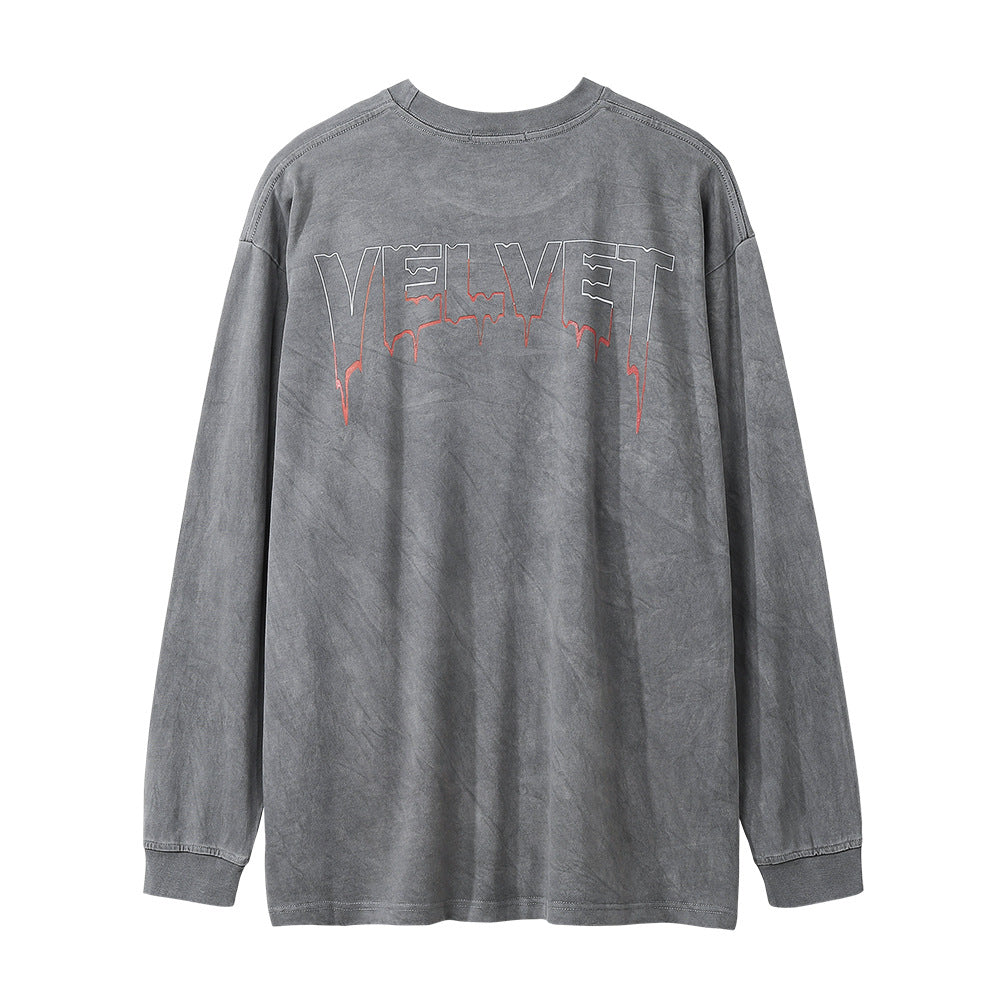 A long-sleeved, grey cotton t-shirt with the word "VELVET" in large, distressed red font across the chest. This collarless top is available in Asian sizes. The Men's Dark Character Old Washed Long-sleeved T-shirt by Maramalive™ is a stylish and comfortable choice for casual wear.