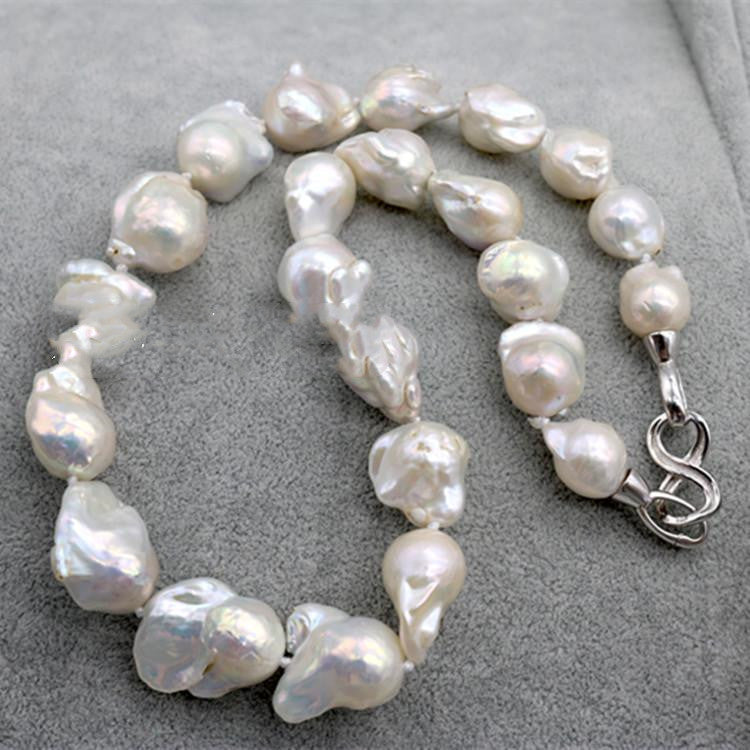 A Baroque Pearl Necklace by Maramalive™ on a mannequin.
