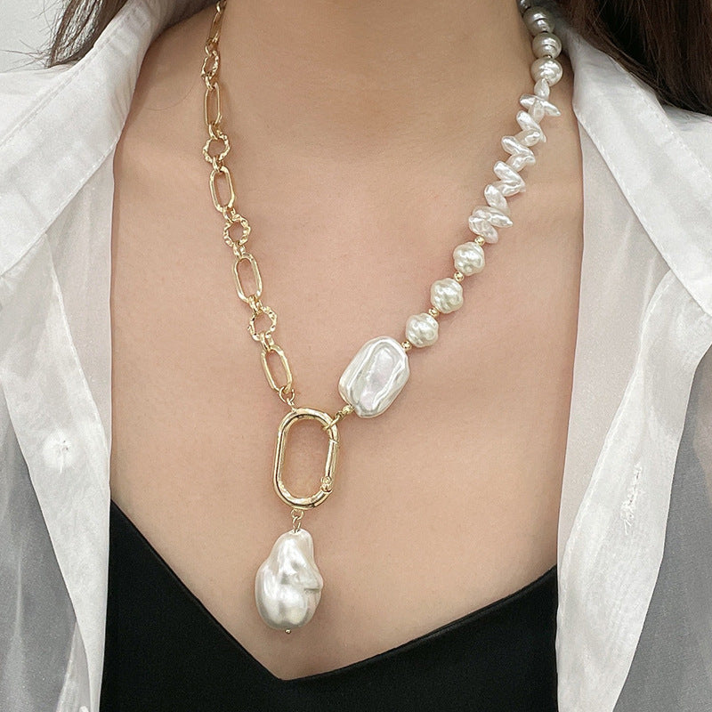 A woman wearing a Maramalive™ Handmade Beaded Baroque Pearl Pendant Necklace For Women with pearl inlaid and gold chains.