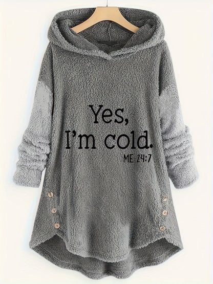 A gray, long-sleeved, hooded pullover hanging on a wooden hanger. Made from soft polyester, it has large buttons on the sides and the text "Yes, I'm cold. ME 24:7" printed on the front. Perfect for a casual day out. Introducing the Fuzzy Casual Two-piece Set, Letter Pattern Button Decor Hoodie & Pants Outfits from Maramalive™ in Women's Clothing.