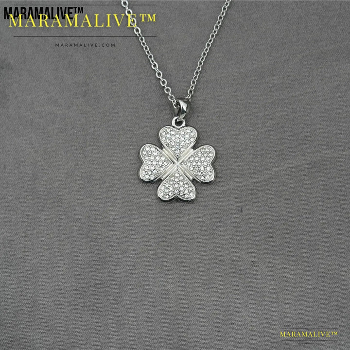 Flower Running Micro Rhinestone Four-leaf Clover Titanium Steel Pendant