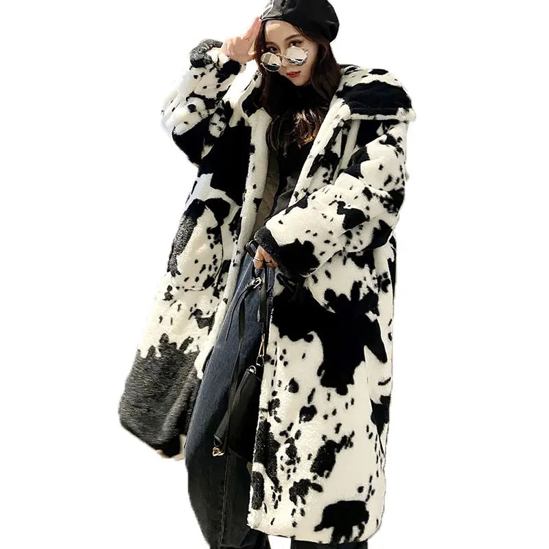 Woman in faux fur hooded parka.