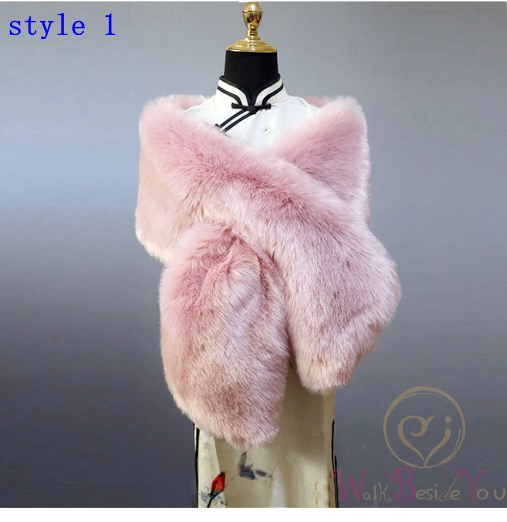 "Mannequin showcases elegant faux fur cape. Pink