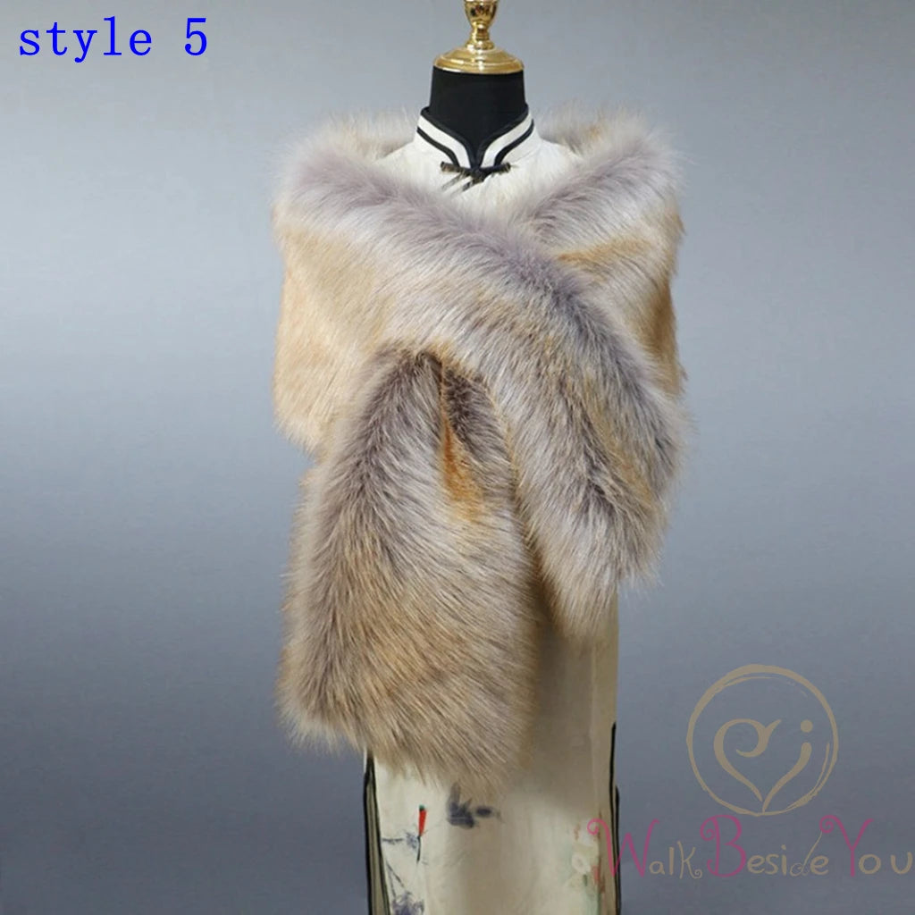"Mannequin showcases elegant faux fur cape. Grey brown and wite