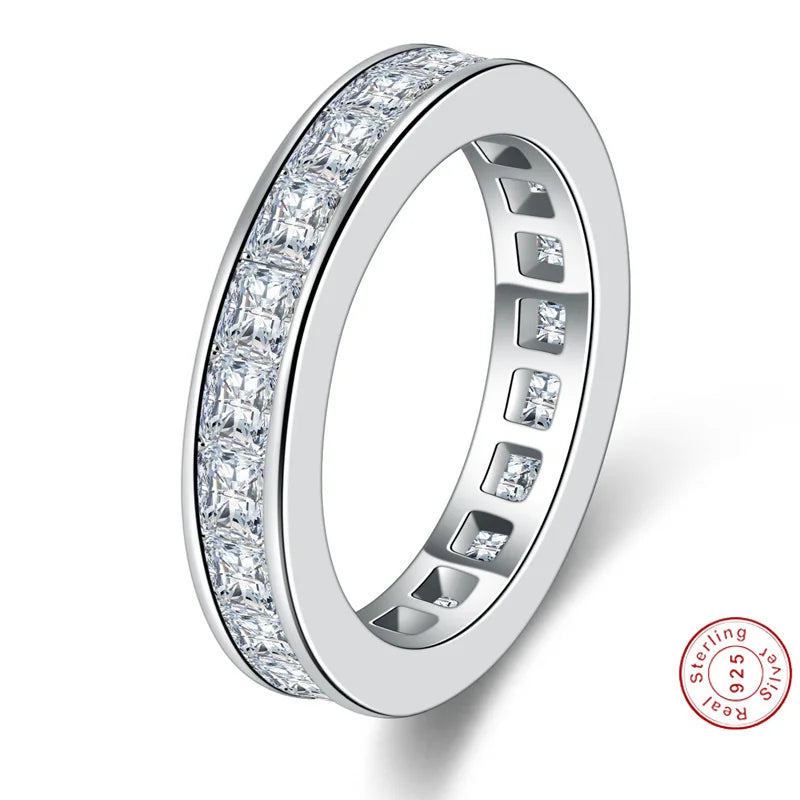 Elegant moissanite engagement and wedding rings.