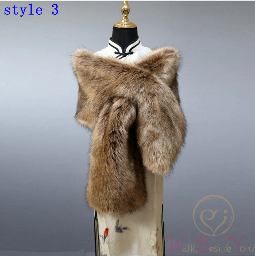 "Mannequin showcases elegant faux fur cape. brown