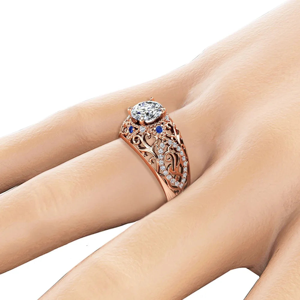 Rose gold moissanite engagement rings displayed.