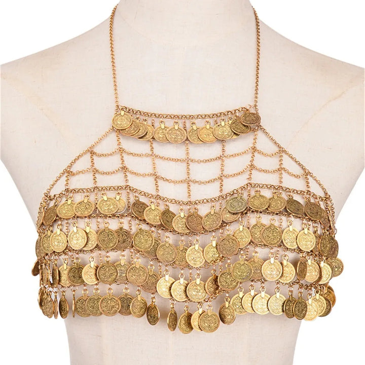 A Maramalive™ Full Coins Tassel Chest Chain For Summer Beach Party Bohemian Gypsy Afghan Ethnic Slave Harness Underwear Bra Sexy Body Jewelry with multiple rows and layers of coins hanging from interconnected chains on a display mannequin, complemented by exquisite belly chains that enhance its allure.