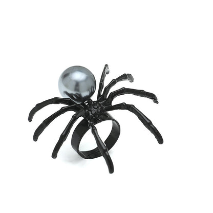 A woman's hand is holding a Spider Silver Ring: Halloween Fashion by Maramalive™.