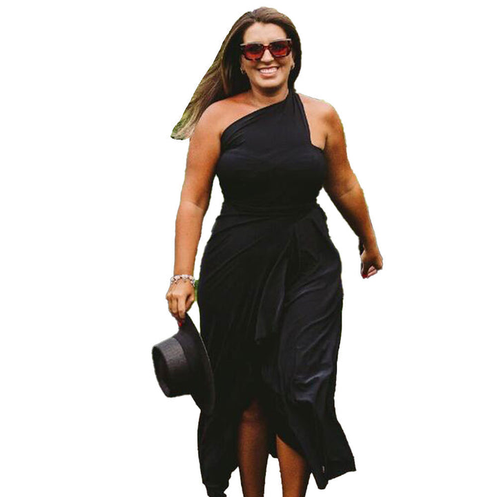 A woman in a Fun Multi-design Choices Wraparound Long Black Dress, gracefully walking on a wooden bridge. (Brand Name: Maramalive™)
