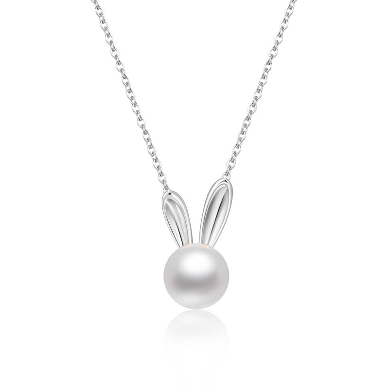 A woman wearing a Maramalive™ S925 Sterling Silver Freshwater Pearl Pendant Clavicle Chain.